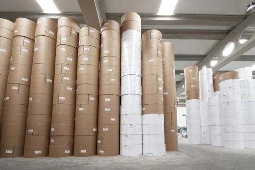 Glassware carefully wrapped in clean newsprint for moving