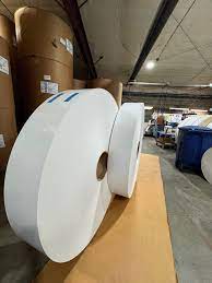 A perfectly wound jumbo roll of high-quality paperboard