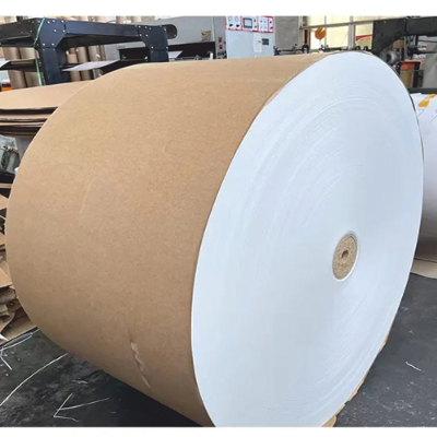 A stack of flat corrugated sheets showing the bright white top surface